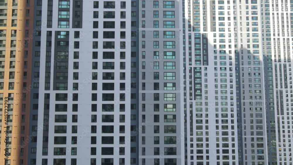 Modern high rise building of residential complex close-up, urban geometry. Modern high rise building of residential complex close-up, urban geometry.