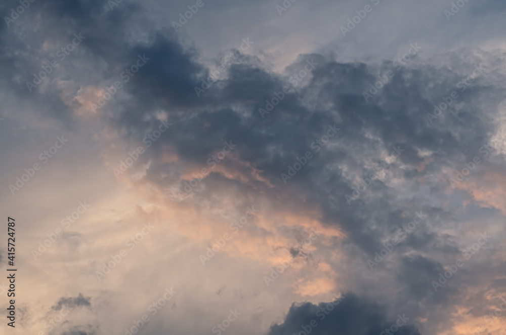 the blue clouds are illuminated by the setting sun the blue clouds are illuminated by the setting sun
