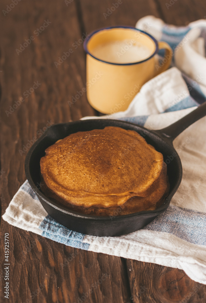 homemade pancakes on wooden background