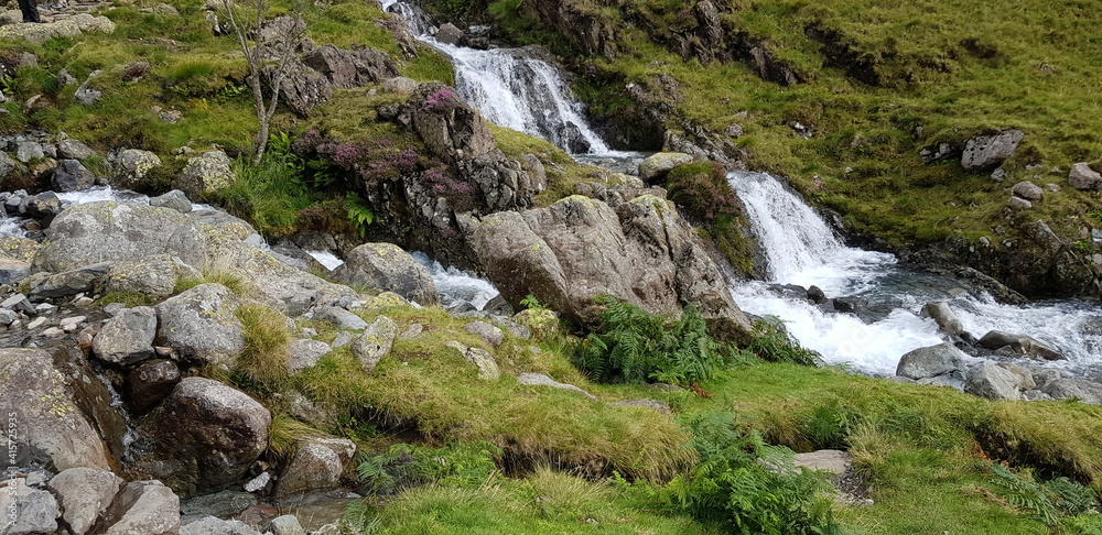 waterfall in the mountains waterfall in the mountains