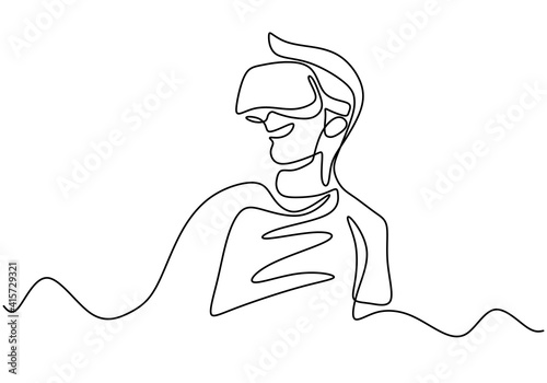 Young man wearing VR glasse...