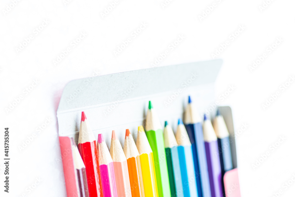 Fototapeta premium Set of colored pencils on white background.