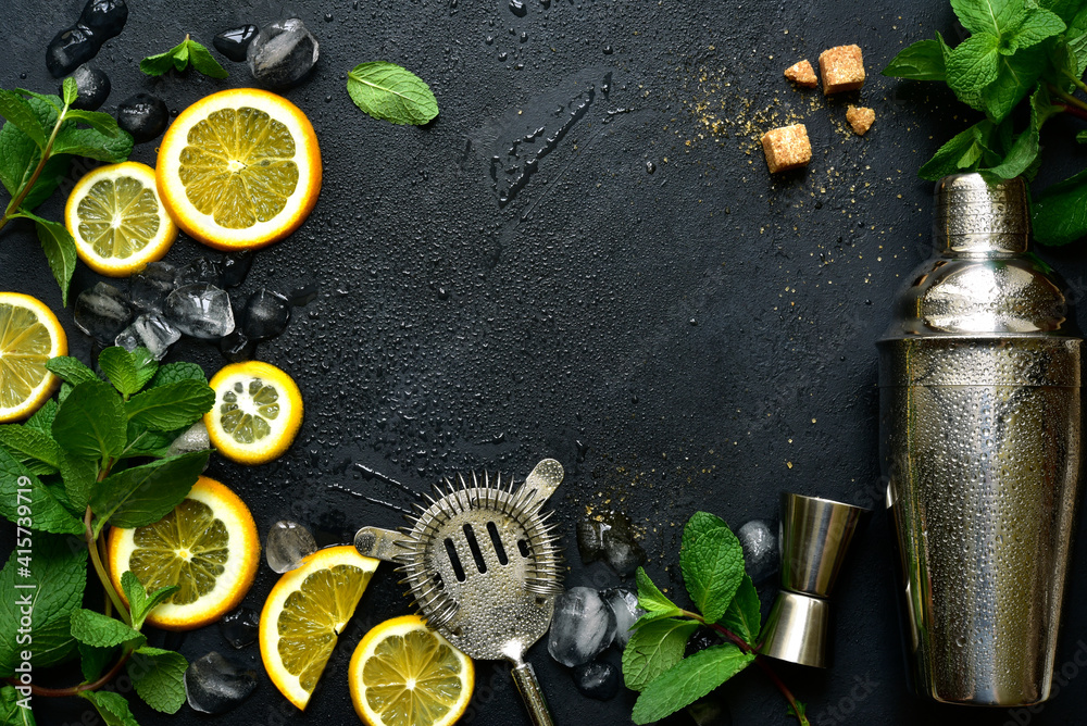 Fresh ingredients for making cold summer citrus cocktail. Top view with copy space. Fresh ingredients for making cold summer citrus cocktail. Top view with copy space.