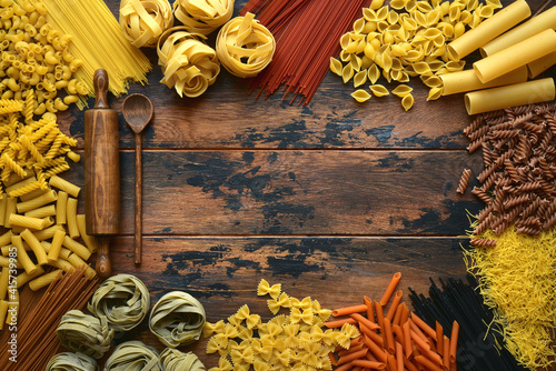 Assortment of natural organic pasta. Top view with copy space. photo