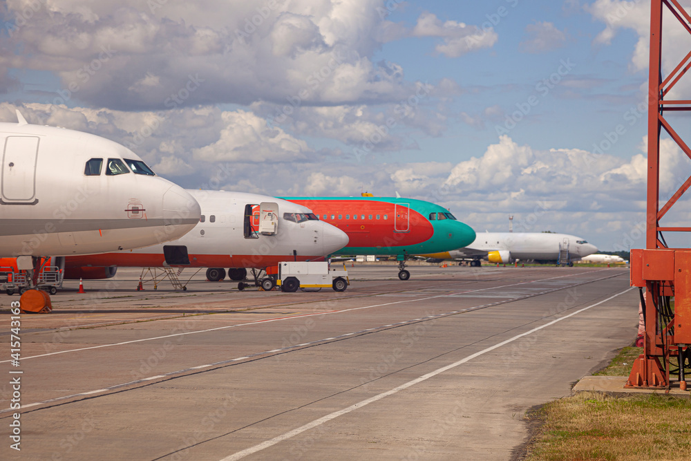 Fototapeta premium Airport with a lot of aircraft. Airplane on the platform International Airport. Runway. Planes.