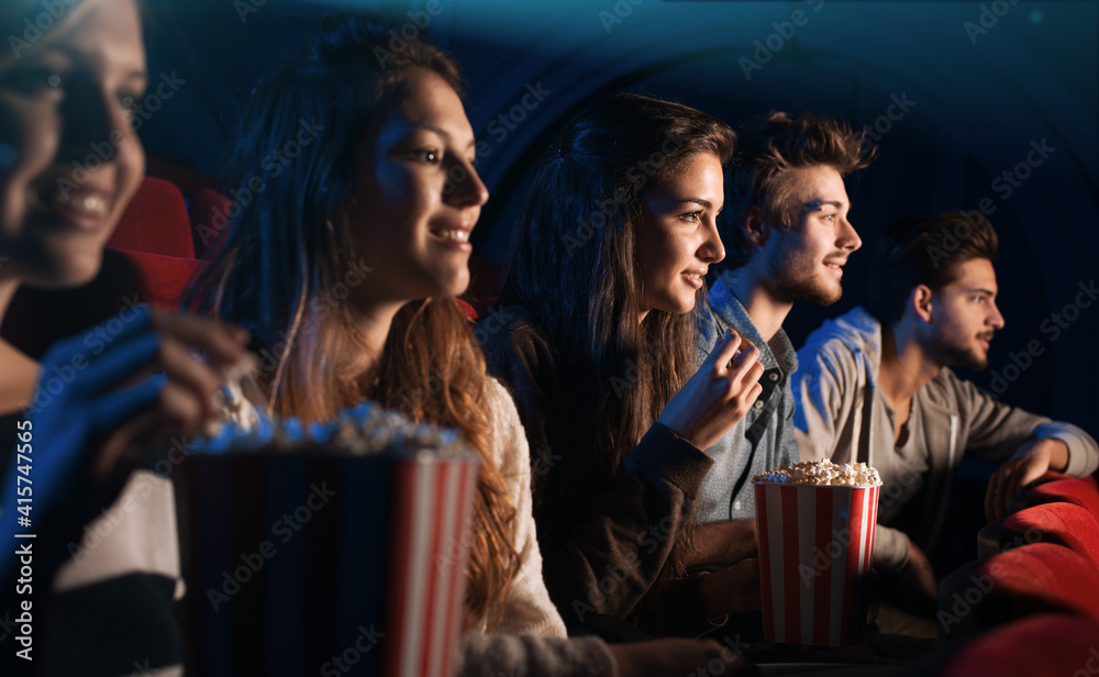 Group of friends in the movie theater