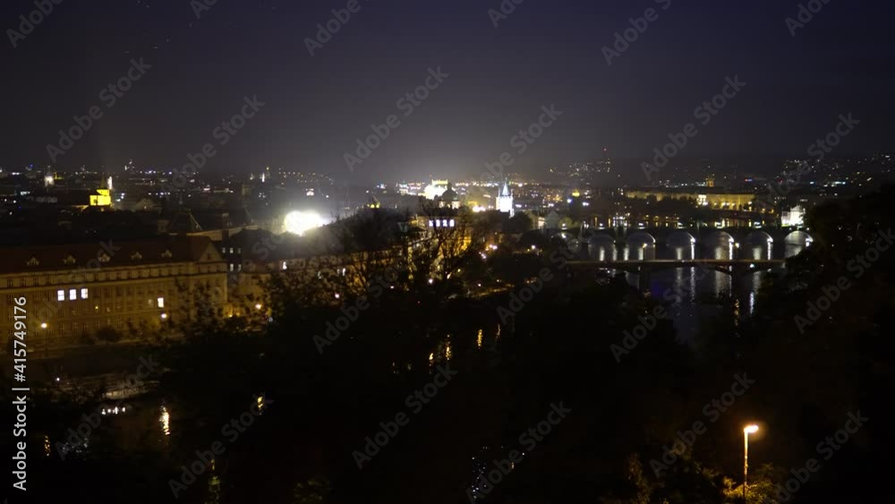 A beautiful cityscape with a river at night - top view A beautiful cityscape with a river at night - top view