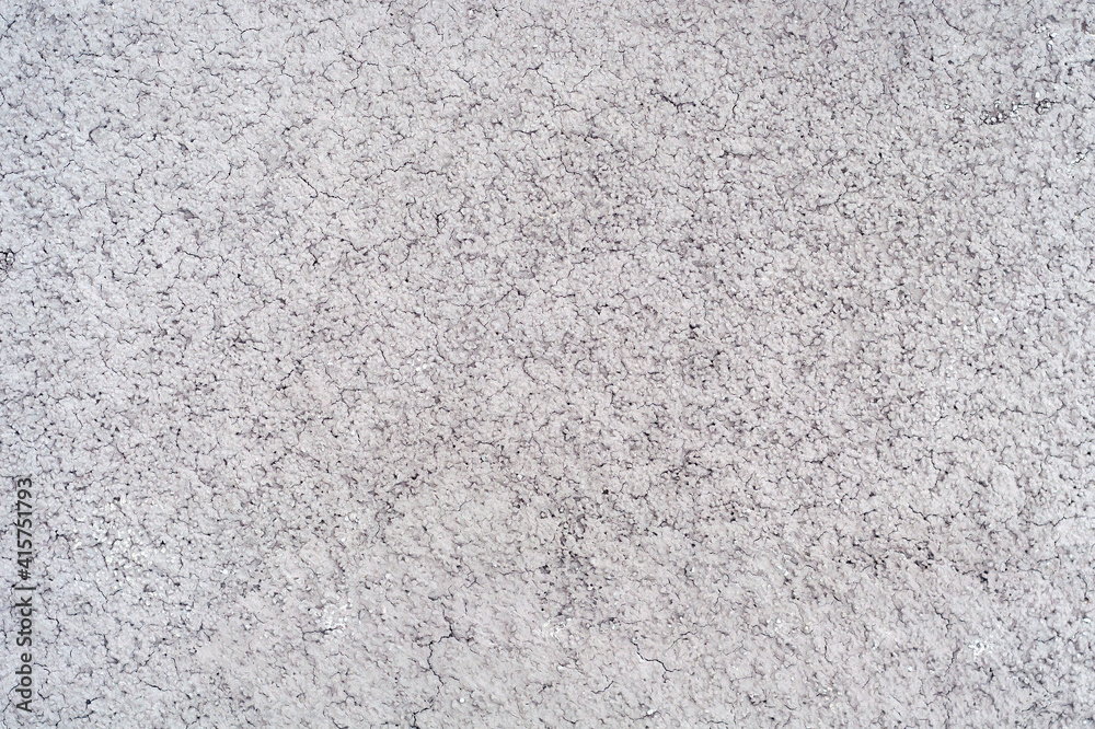 embossed gray texture with small cracks and bumps embossed gray texture with small cracks and bumps