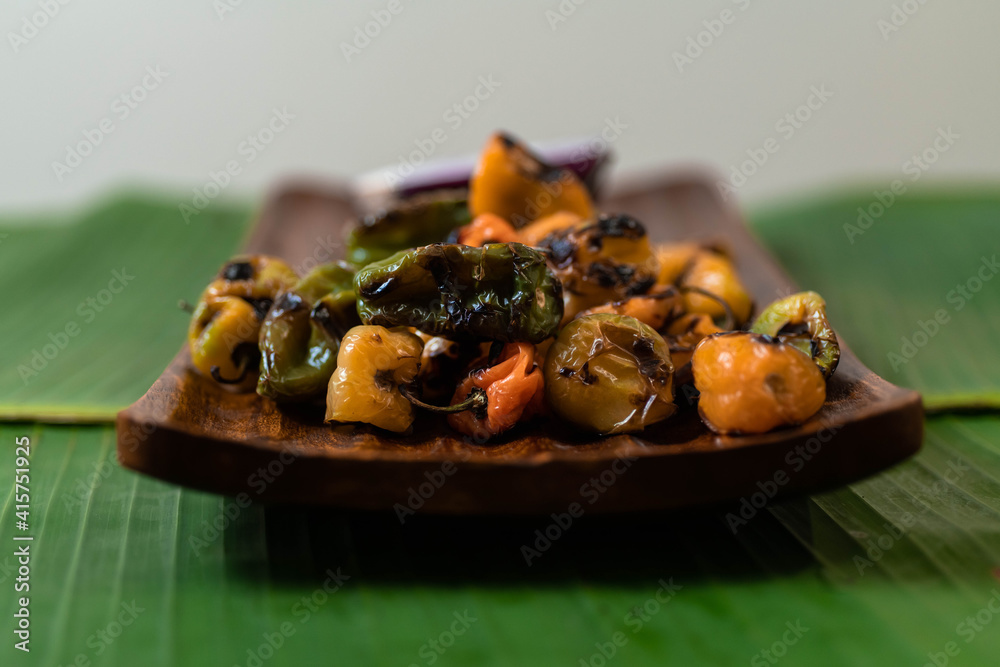 lightly burned habanero peppers for spicy Mexican sauce