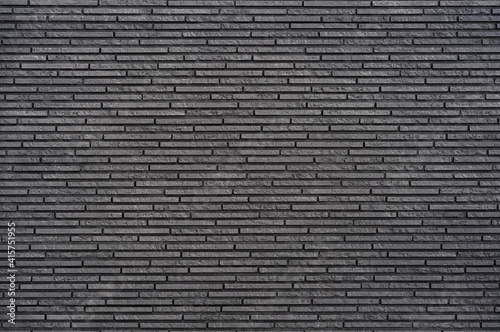 gray background from decorative facing in the form of masonry