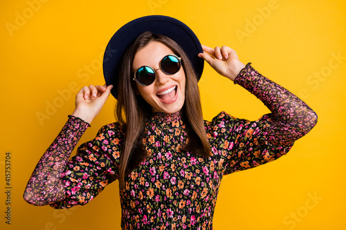 Portrait of funky person open mouth eyewear hands touch headwear retro outfit isolated on yellow color background