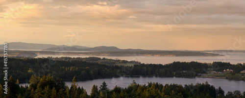 looking across a lake and distant islands at dusk