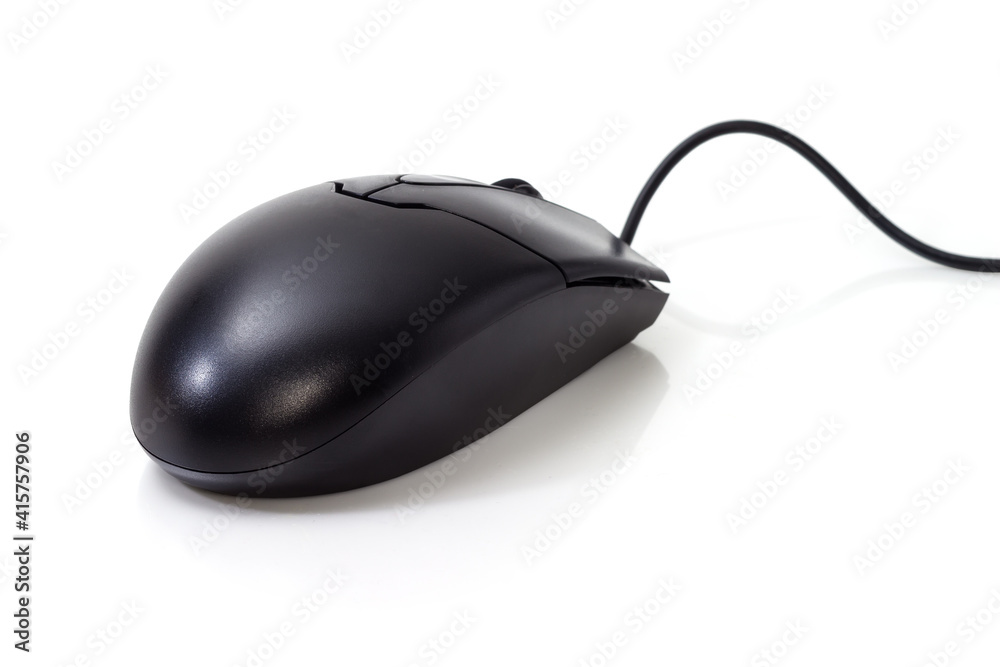 Black wired computer mouse close-up in selective focus Black wired computer mouse close-up in selective focus