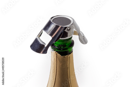 Special bottle stopper for sparkling wine storage on bottle photo