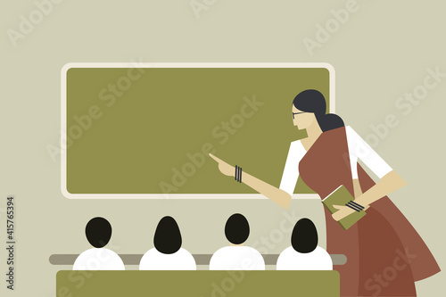 A traditionally dressed Indian teacher and students in a class room