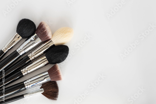 Set of large cosmetic brushes on white background