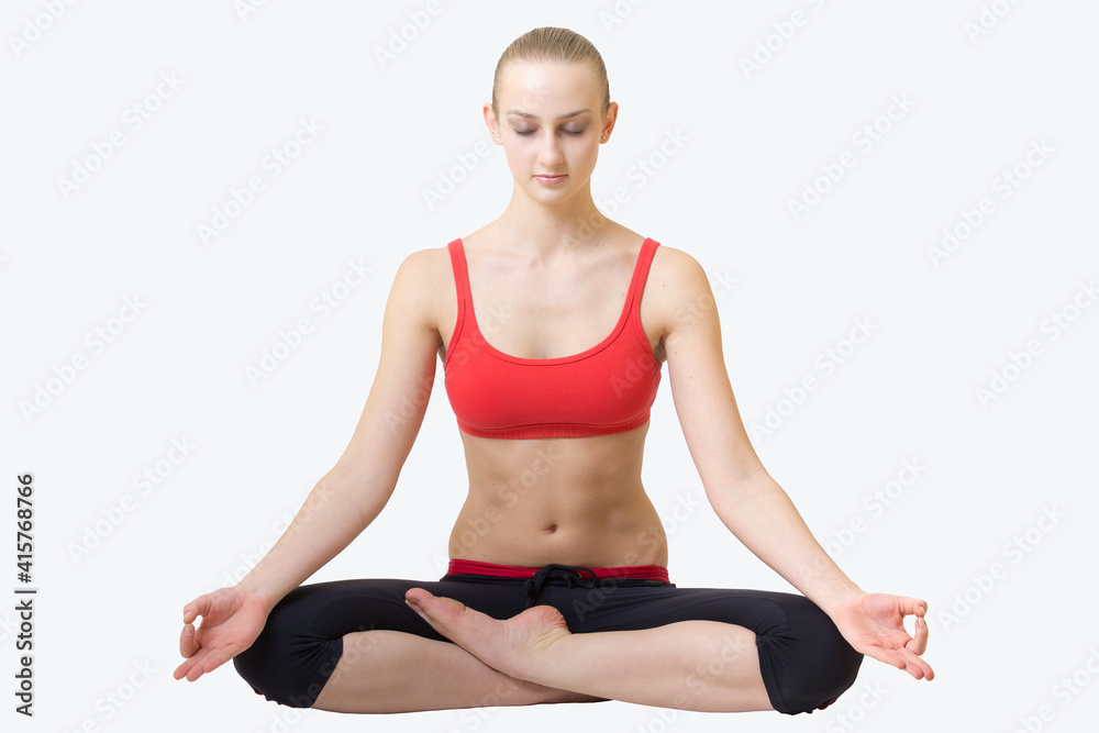 young blond hair woman in yoga pose siddhasana young blond hair woman in yoga pose siddhasana
