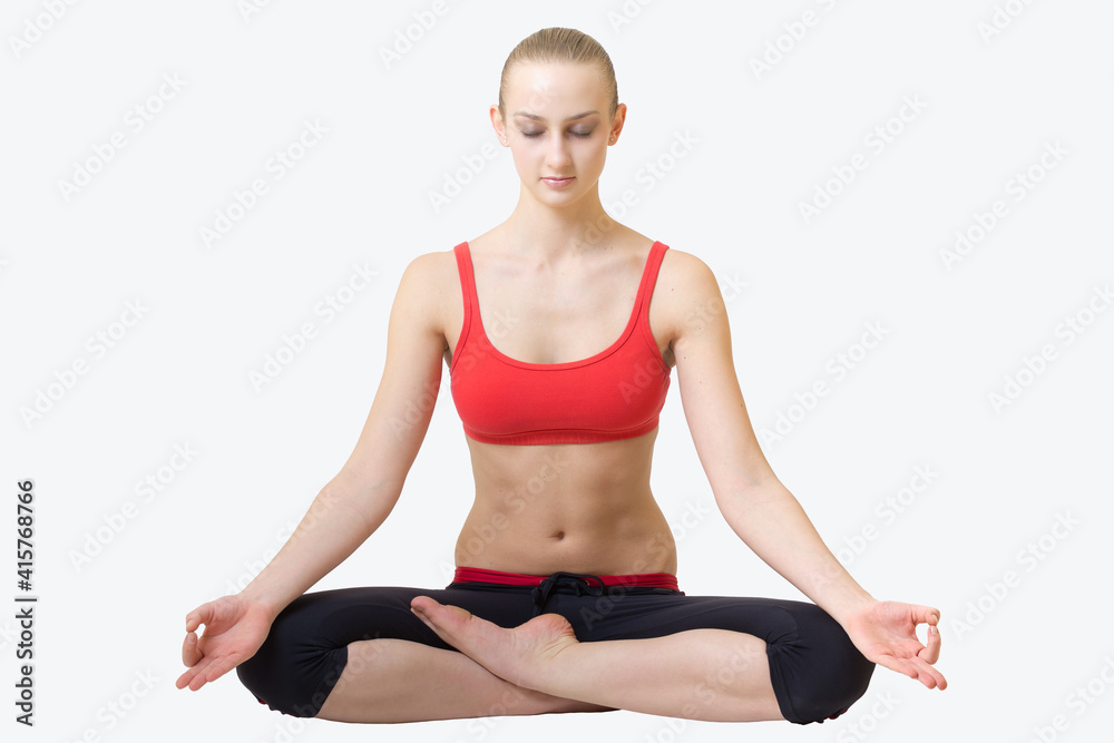 young blond hair woman in yoga pose siddhasana