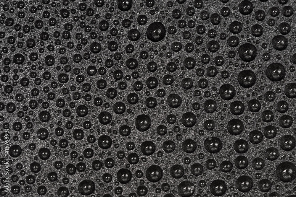 Water drops on black background texture. Dark backdrop glass covered with drops of water. gray bubbles in water Water drops on black background texture. Dark backdrop glass covered with drops of water. gray bubbles in water