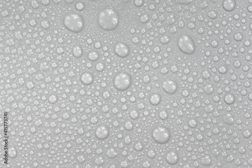 Water drops on white background texture. backdrop glass covered with drops of water. bubbles in water