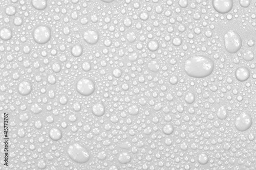 Water drops on white background texture. backdrop glass covered with drops of water.  bubbles in water