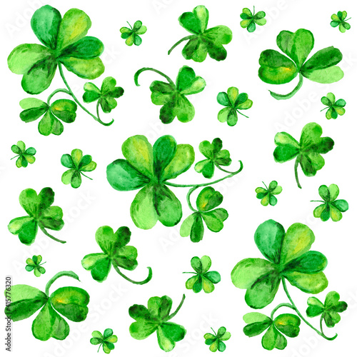 Pattern with green shamrock painted of watercolor on white background