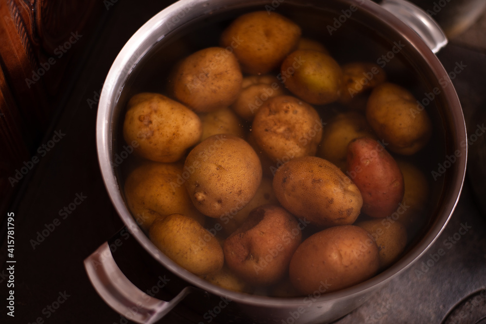 a pot of boiled potatoes at home on the stove a pot of boiled potatoes at home on the stove