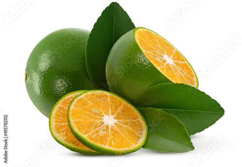 Calamansi or Green orange fruits isolated on white background photo