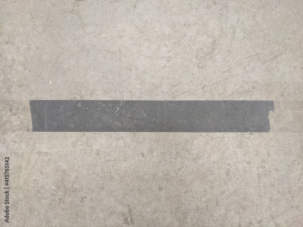 Fototapeta premium Gray stripe on a gray background. Texture. Seamless background.