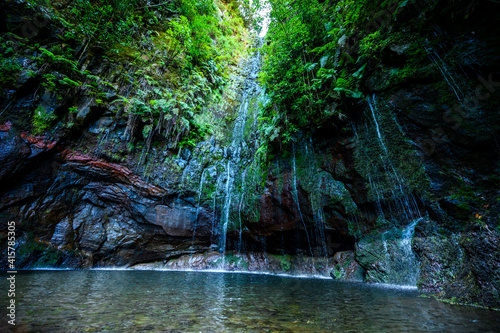 25 Fontes Waterfall - Hiking Levada trail in Laurel forest at Rabacal - Path to the famous Twenty-Five Fountains in beautiful landscape scenery - Madeira Island  Portugal