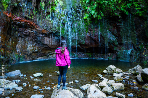 25 Fontes Waterfall - Hiking Levada trail in Laurel forest at Rabacal - Path to the famous Twenty-Five Fountains in beautiful landscape scenery - Madeira Island, Portugal photo