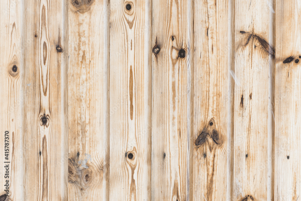 Fototapeta premium Grunge wood texture. Raw brown wooden wall background. Rustic tree desk with knots pattern. Countryside architecture wall. Village building construction.