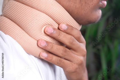 man suffering throat pain close up .