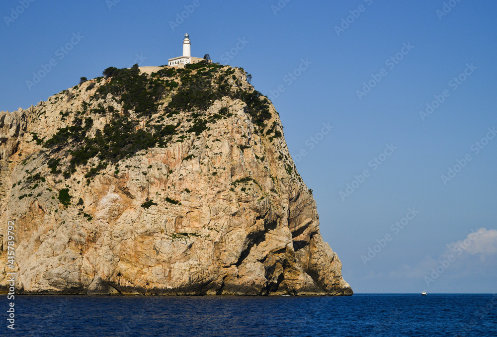 Lighthouse on edge of coastal cliff Lighthouse on edge of coastal cliff
