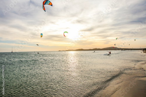 Fototapeta Naklejka Na Ścianę i Meble -  Kitesurfing session in the sunset in lagoon in Colombia 
