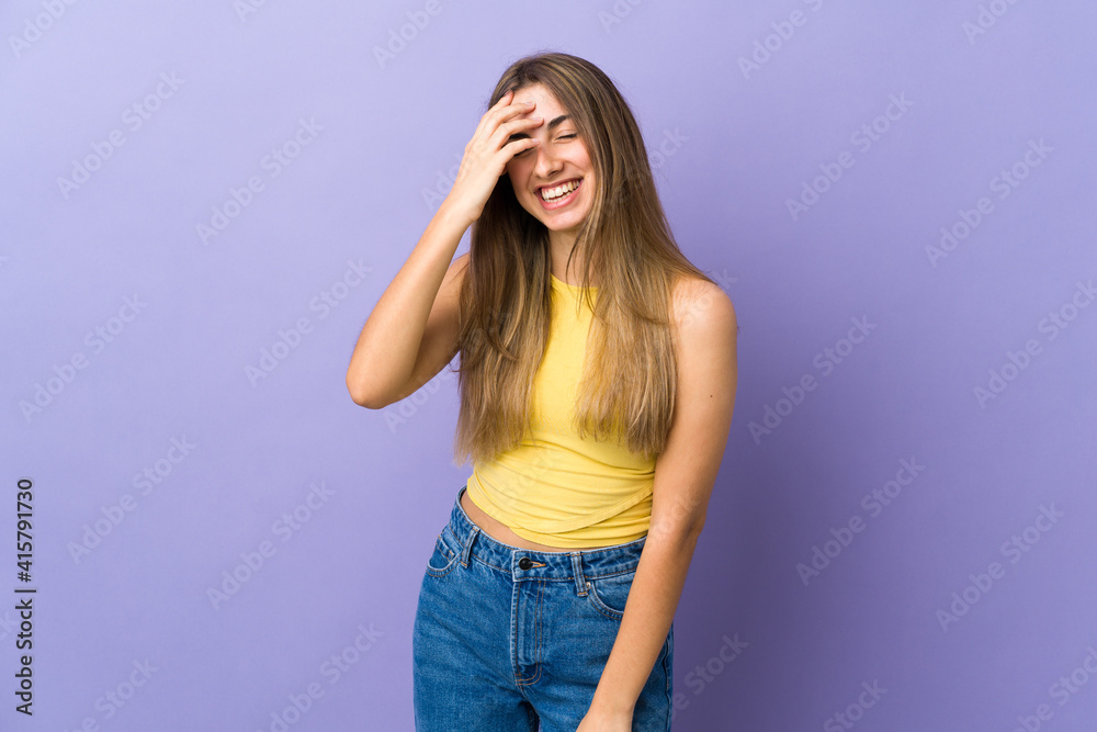 Young woman over isolated purple background laughing Young woman over isolated purple background laughing
