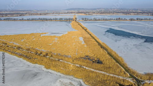 stawy rybne hodowlane w zimie z lotu ptaka na Śląsku w Polsce