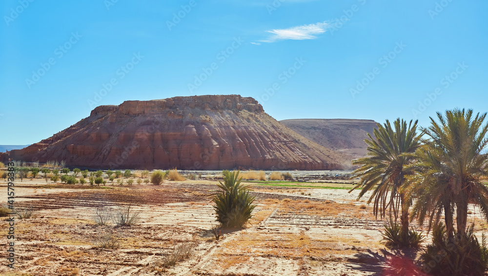 Landscape of southern Morocco is characterized by mountains, plains, stony soil.
