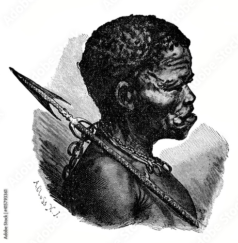 Zulu warrior with shield and African weapons and culture. Vintage antique illustration. 19th century. photo