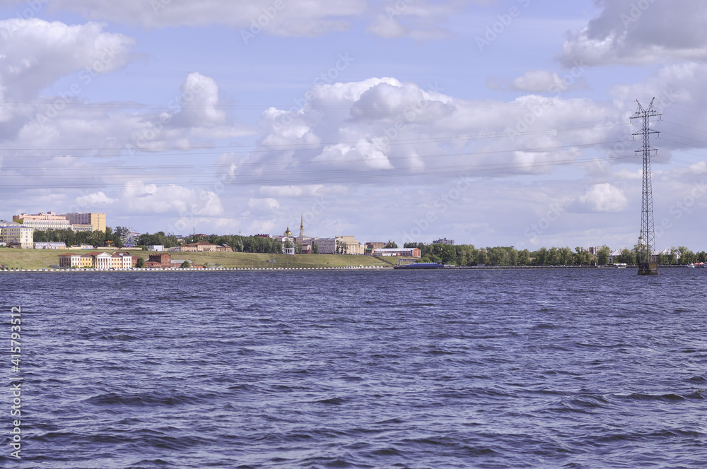 Panorama of the city of Izhevsk. water in the foreground. A city on the shore of a pond, lake. Russia. 