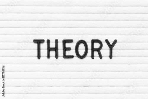 Black color letter in word theory on white felt board background