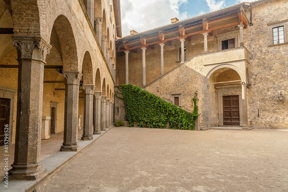 Bracciano, Rome, Italy, August 2019: Inner courtyard of the Orsini Odescalchi Castle on Bracciano Lake, built in the 15th century, Rome, Lazio, Italy