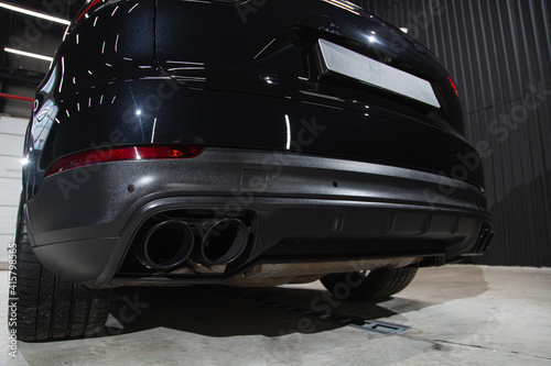 Car detailing series : Close-up. car exhaust, bumper.