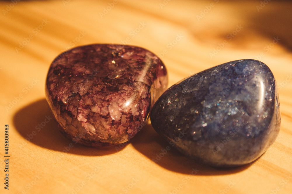Fototapeta premium Two tiny rocks with pretty colors and nice textures