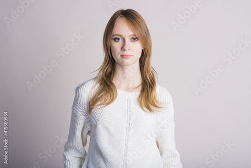 Beautiful woman portrait on white background in studio © Павел Костенко