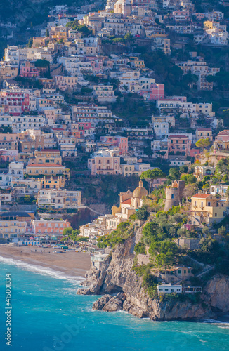 Colored houses on the hill in Amalfi leading down to coast, Campania, Italy