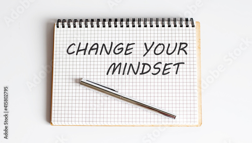 Wallpaper Mural Notebook with pen , text Change Your Mindset ,concept Torontodigital.ca