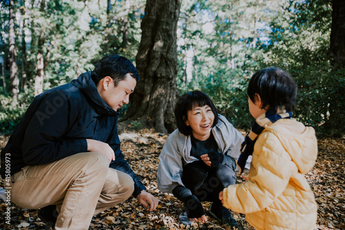 Happy japanese family spending time outdoor