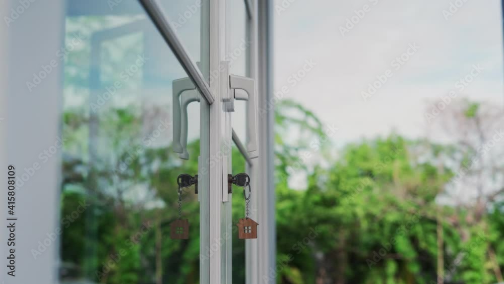 The house key for unlocking a new house is plugged into the door. The house key for unlocking a new house is plugged into the door.