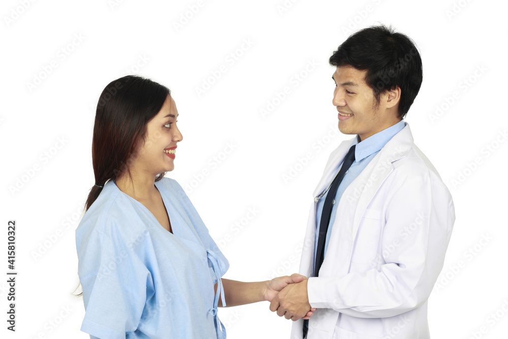 isolated doctor smiling and holding the hand of the young woman's patient to thank and encourage. Healthcare and medical concept. isolated doctor smiling and holding the hand of the young woman's patient to thank and encourage. Healthcare and medical concept.